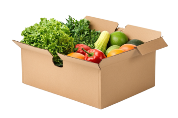 Cardboard box with food vegetables and fruits in a cardboard box food delivery and food bank concept