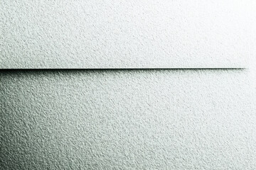 Fototapeta premium Textured surface, minimalist composition, stark contrast, clean lines, subtle gradient, abstract geometry, monochromatic palette, light and shadow play, close-up perspective, architectural detail