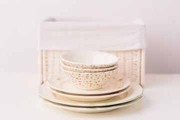 Closeup of porcelain plates and bowls