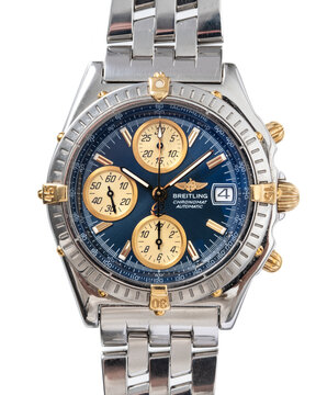 Dial detail, Breitling Chronomat. Automatic chronograph, steel and gold case. White background. Milan. Italy September 20, 2024