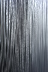 Obraz premium Abstract Metallic Texture with Vertical Lines and Soft Lighting