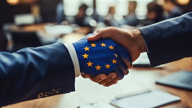 Professional partners negotiating, EU flag reflecting on handshake in corporate conference space