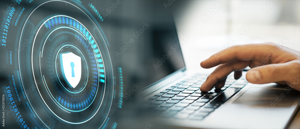 Poster Digital security interface with shield icon on virtual screen and hand typing on laptop keyboard in modern workspace environment.