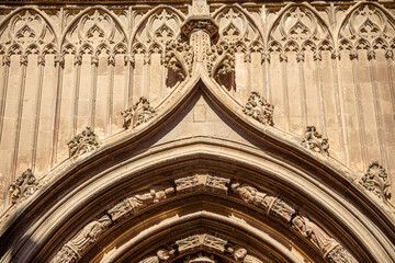 Fototapeta premium Detail of the Gothic facade of the Apostles of the Cathedral of Santa María in Murcia, Spain, in daylight