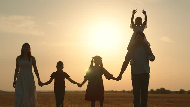boy girl mother father son daughter dream teamwork hands up sun silhouette religion faith together vacation travel Christianity, family holiday traditions, children s leisure activities, parenting
