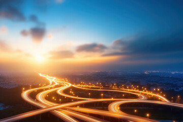 Fototapeta premium Sunset over winding highways with city lights illuminating the evening sky