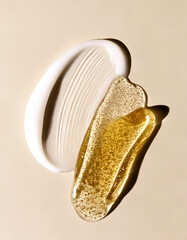 Fototapeta premium An image of cosmetic skincare textures with smears of white cream and clear yellow gel on a beige background.