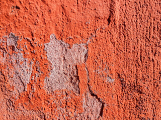 Abstract red weathered concrete wall texture as background