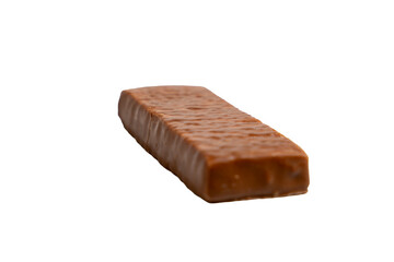 Brown chocolate bar. He sits on a transparent background. The bar is long and thin.