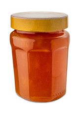 Apricot jam in glass jar with yellow cap isolated