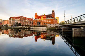 Malmö-City-Hall at golden hour and reflections