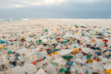 Obraz premium microplastic, Plastic Pollution On Beach Shores And Beaches. Images Show