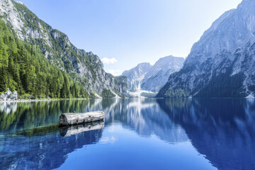 Fototapeta premium Breathtaking mountain lake with clear blue water and reflections