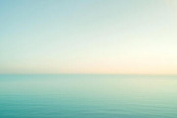 Obraz premium Calm teal ocean sunrise, serene seascape background, ideal for relaxation