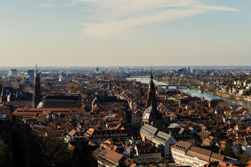 Fototapeta premium Heidelberg: Romantic city on the Neckar River, famous for its castle, historic old town, Germany’s oldest university, and picturesque scenery between the Neckar Valley and the Odenwald Forest