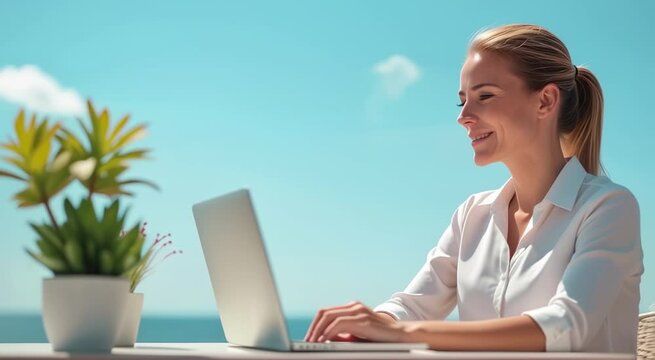Business woman working on laptop in open with blue sky in background