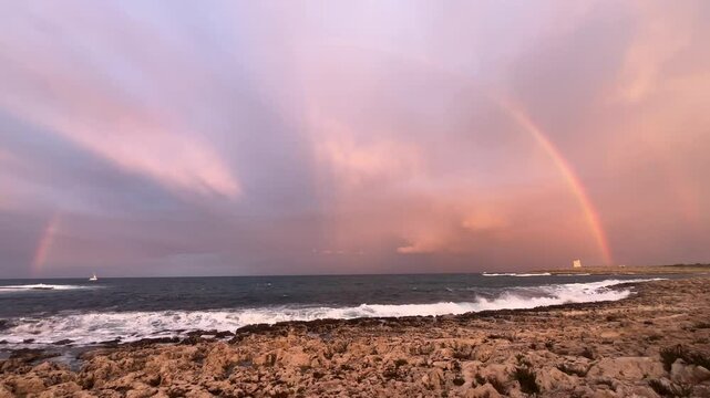 Sunset and rainbow on the Mediterranean Sea