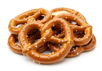 A pile of salted pretzels with shiny surfaces and coarse salt isolated on white background