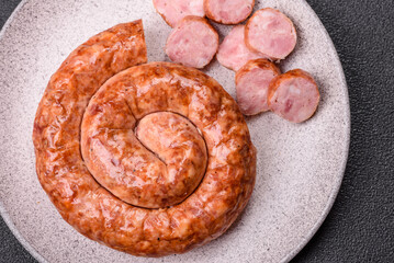 Delicious homemade sausage in the shape of a snail or spiral