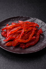 Dried chicken slices, jerky, with cherry or plum flavor, salt and spices