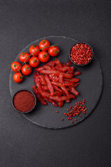 Dried chicken slices, jerky, with cherry or plum flavor, salt and spices