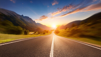 Naklejka premium lengthy empty mountain street beneath a brilliant sunset on a sunny summer day with a speed movement blur effect best for a copy area picture