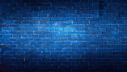 blue neon light on a brick wall at night