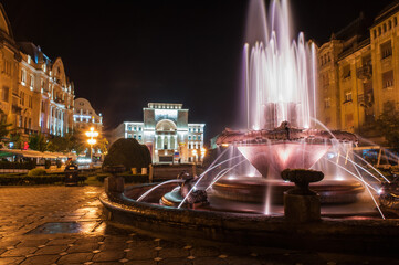Timisoara,Romania - 21 September 2019 : The center of Timisoara with the city lights and its beautiful old historical buildings