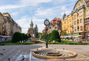 Timisoara,Romania - 15 August 2019 : The center of Timisoara on a sunny day with beautiful blue sky and white clouds