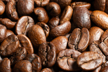 Decaffeinated coffee beans roasted close up