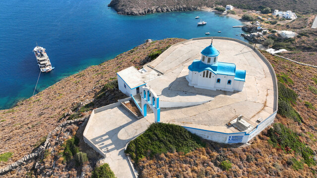 Aerial drone photo of main church and small port of Thimena island next to Fourni island, North Aegean sea, Greece