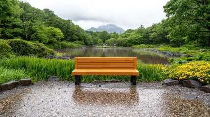 Obraz premium Tranquil park bench, rain, pond, mountain view, serene nature escape