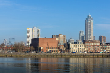 Fototapeta premium Zalmtoren and buildings in the area, in the foreground part of the dock of Katendrecht