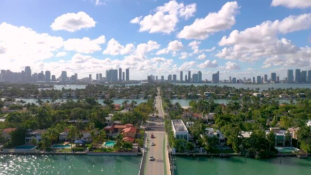 MIAMI, UNITED STATES - FEBRUARY 8, 2025: Aerial view of Miami skyline and lush neighborhoods under a clear sky