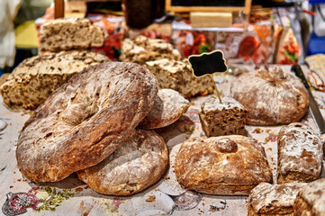 Rustic artisan bread displayed at a local market