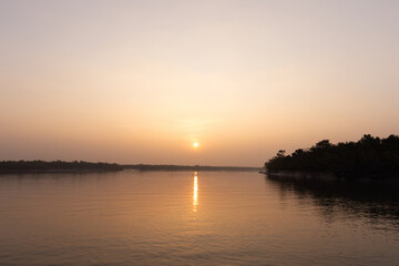 Naklejka premium Beautiful sunrise at mangrove forest of Sundarban tiger reserve, India