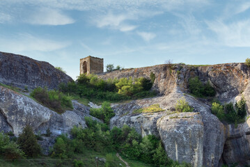 Fototapeta premium Small stony bower on rock near ancient cave settlement Eski-Kermen (Crimea, Ukraine).