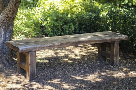 A rustic wooden bench basks in dappled sunlight amidst a lush garden, evoking serenity and contemplation.