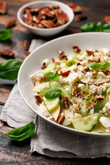 Crunchy Celery, Apple, Cucumber and Feta Cheese Salad. Healthy food.