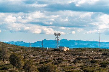Repeater antenna for television, in a hill on a cloudy morning 