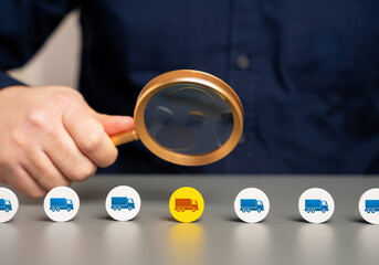 An official examines a truck in a freight stream. Economic assessment. Customs control. Import and...