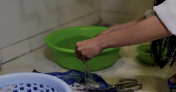 cook sea urchin Fresh scallops, oysters, sea urchin. Fresh seafood. asian hands cutting sea urchin in half cutting off needles process of cooking delicacies in vietnam thailand near sea in kitchen