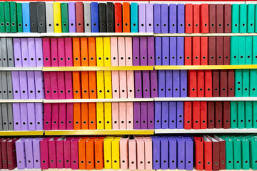 Many colorful document folders as background, texture, pattern.