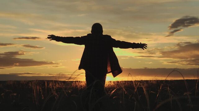 American boy runs across field with his hands up, childhood dream airplane pilot, happy child run sunset, european, memory concept, happy family dream, spring break, wants become airplane pilot