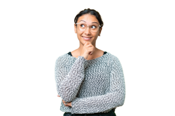 Young Uruguayan woman over isolated chroma key background thinking an idea while looking up