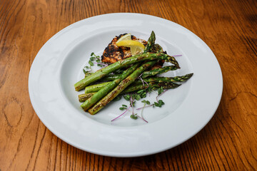 Plated salmon and asparagus