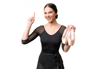Young caucasian woman practicing ballet over isolated background pointing up a great idea
