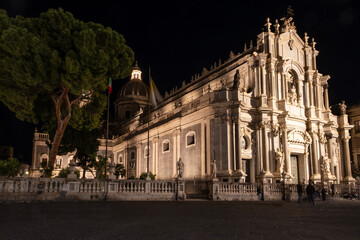Fototapeta premium Night view of the main cathedral in Catania, beautifully illuminated against the dark sky.