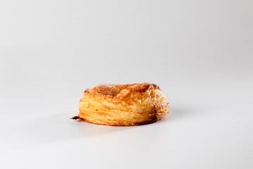 A delicate, flaky pastry filled with smooth ricotta cheese, capturing the simplicity and richness of this classic Sicilian or italian treat in a close-up shot.