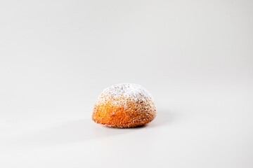 A Camilla curtain, featuring soft, elegant fabric with delicate patterns, gracefully hanging in a bright, airy space, adding a touch of sophistication to the room.